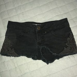 Black denim shorts